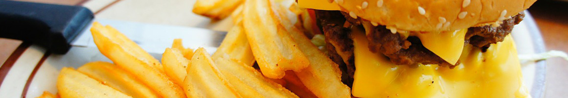 Eating Burger Fast Food at Nation's Giant Hamburgers restaurant in El Cerrito, CA.